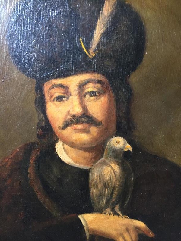 Nobleman with a bird ( oil on panel )