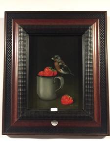 Bird eating strawberries