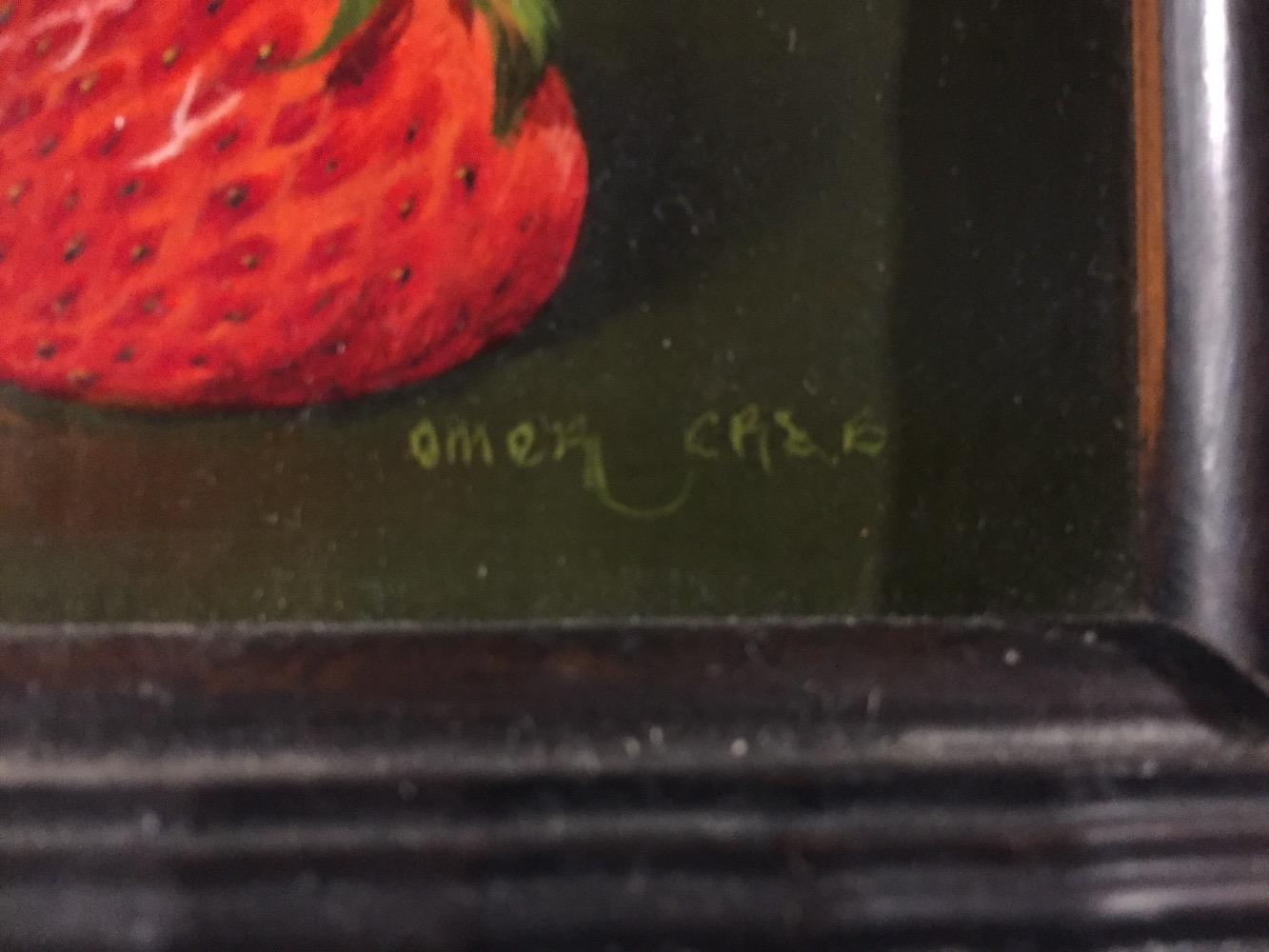 Bird eating strawberries