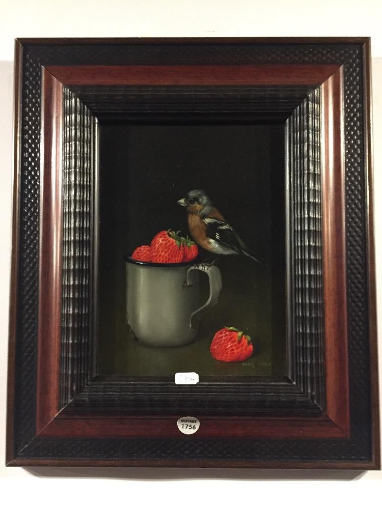 Bird eating strawberries