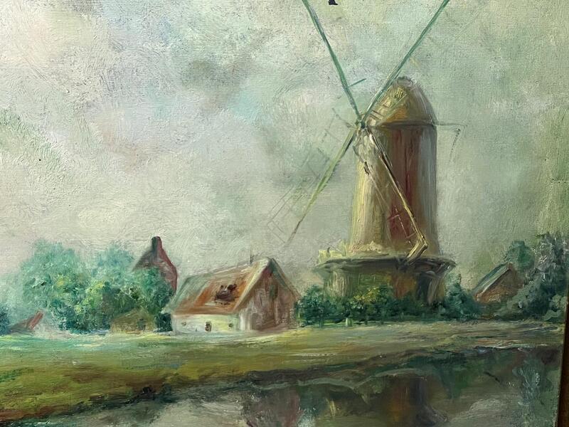 The windmill at the riverside ( oil on canvas )